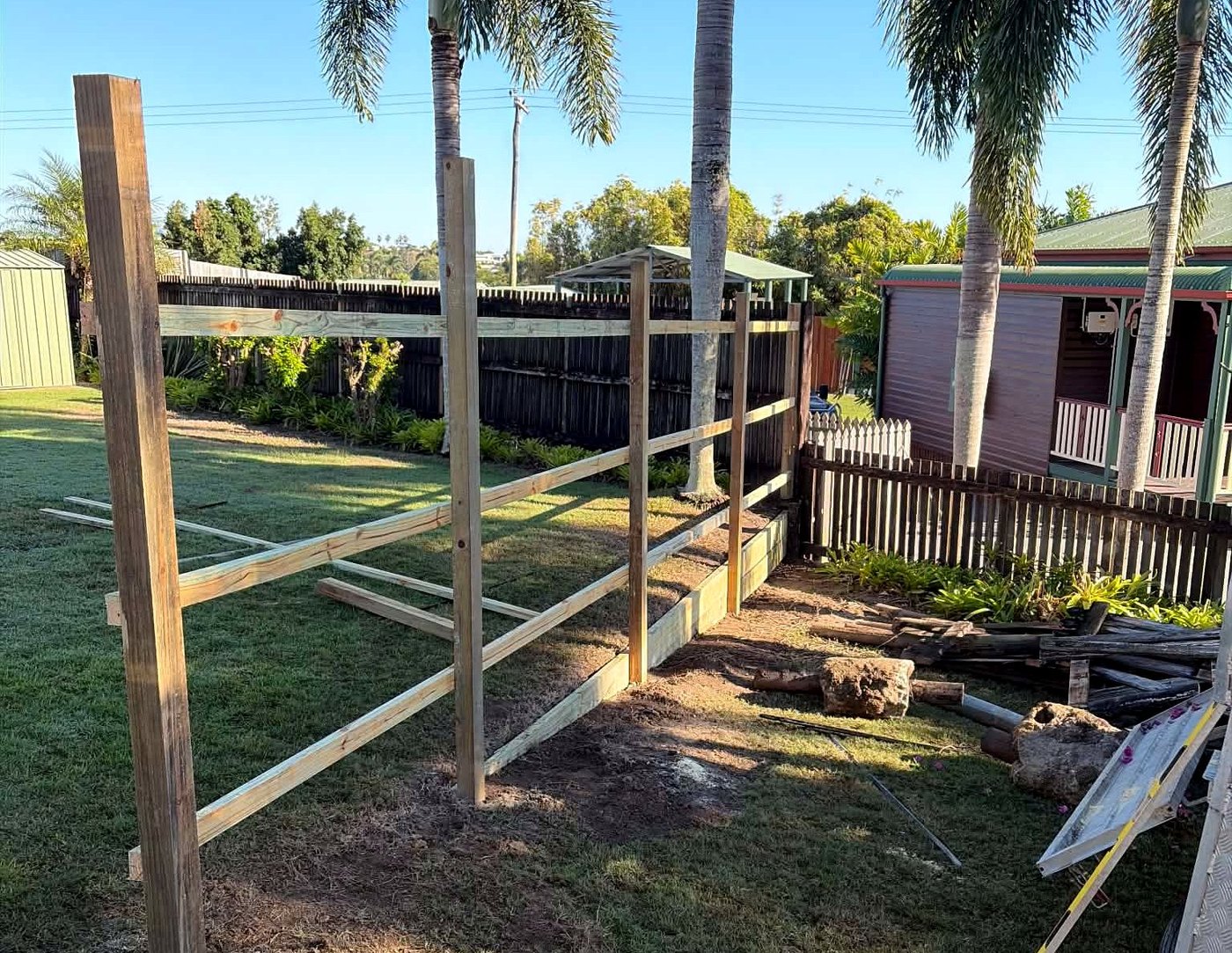 Post and rail frame going up for a new timber fence in Mackay