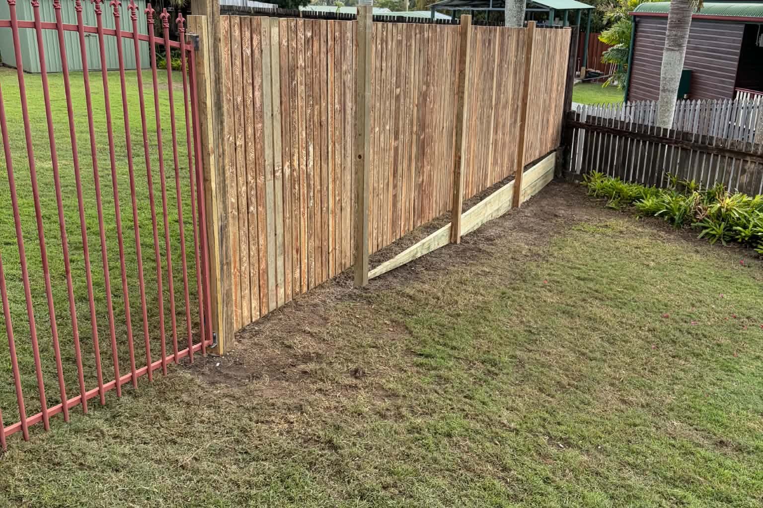 Finished timber paling fence built in a Mackay backyard